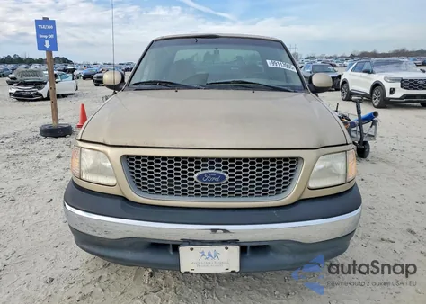 1999 Ford F150 z USA, uszkodzony, nr VIN 1FTZX1727XNA71404